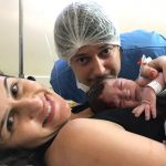 Primeira fotografia em família do Luis.