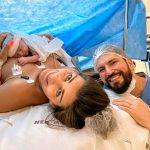 Felicidade estampada no rosto dos papais.