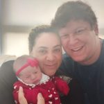 Felicidade estampada no rosto dos papais.