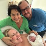 Primeira foto em família da Romana.